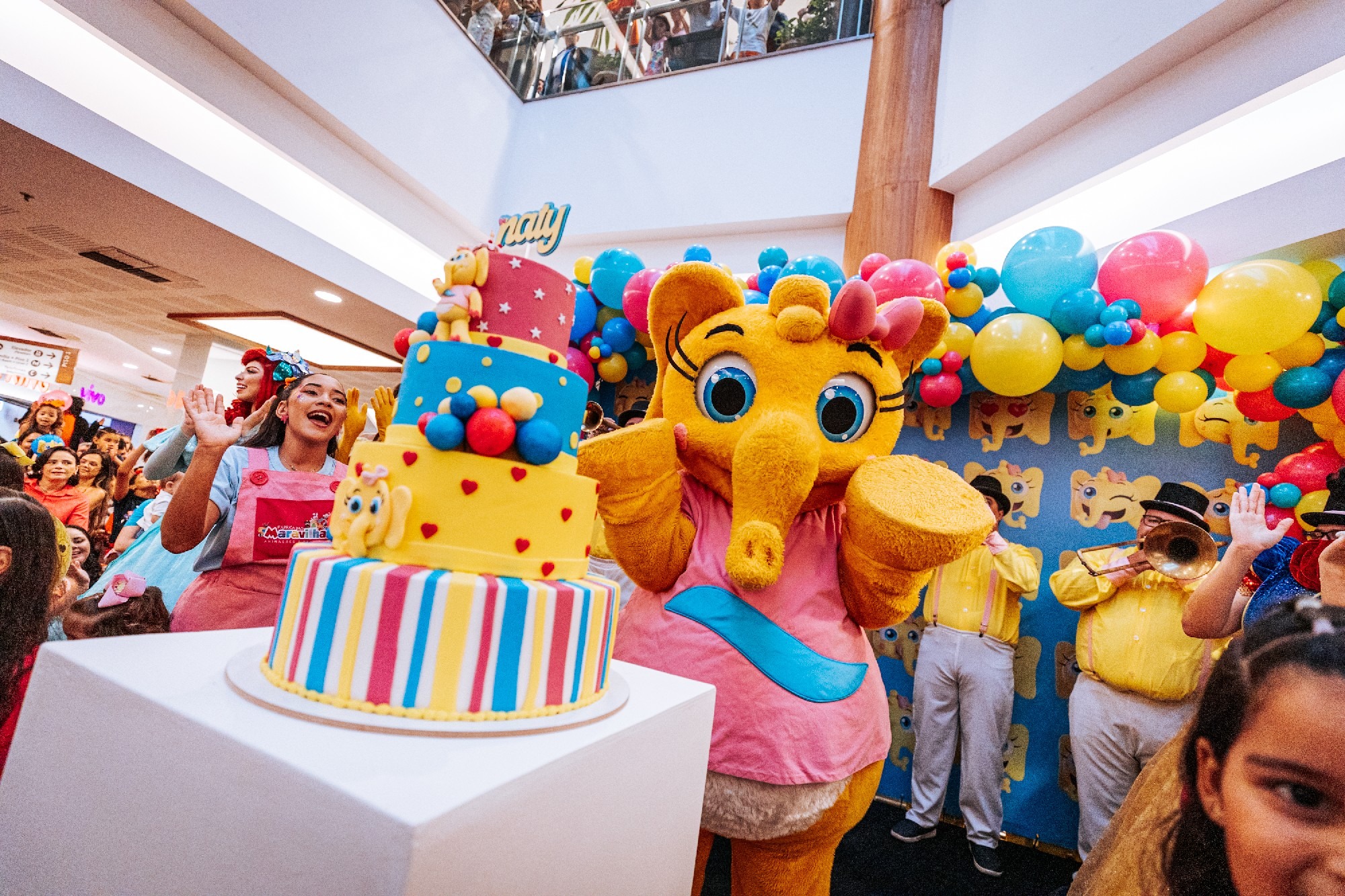 Além das atrações, quem quiser levar um souvenir para casa poderá visitar a lojinha da Naty e adquirir brindes exclusivos da mascote, disponíveis para resgate por meio do programa de relacionamento MaisNAT.